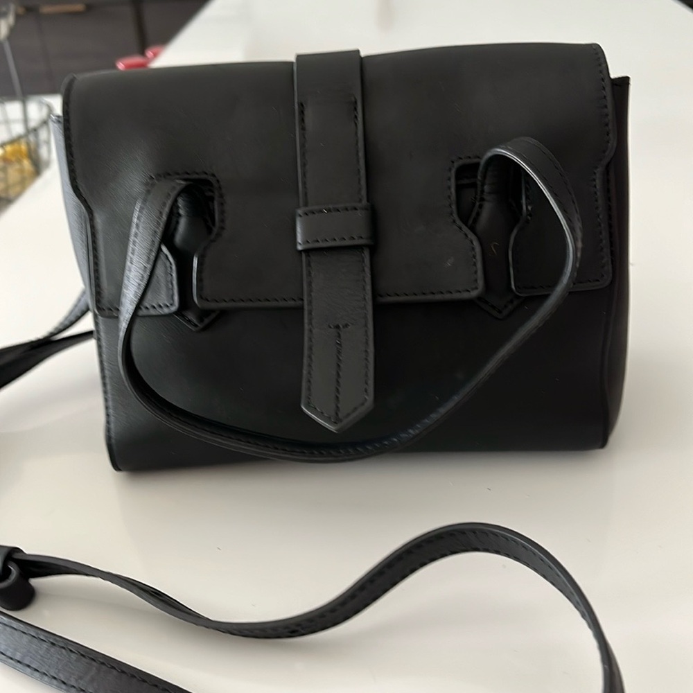 Black Mini Bag with Modern Design and Adjustable Strap